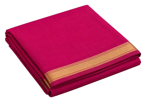A folded magenta cotton saree with a narrow gold-coloured border
